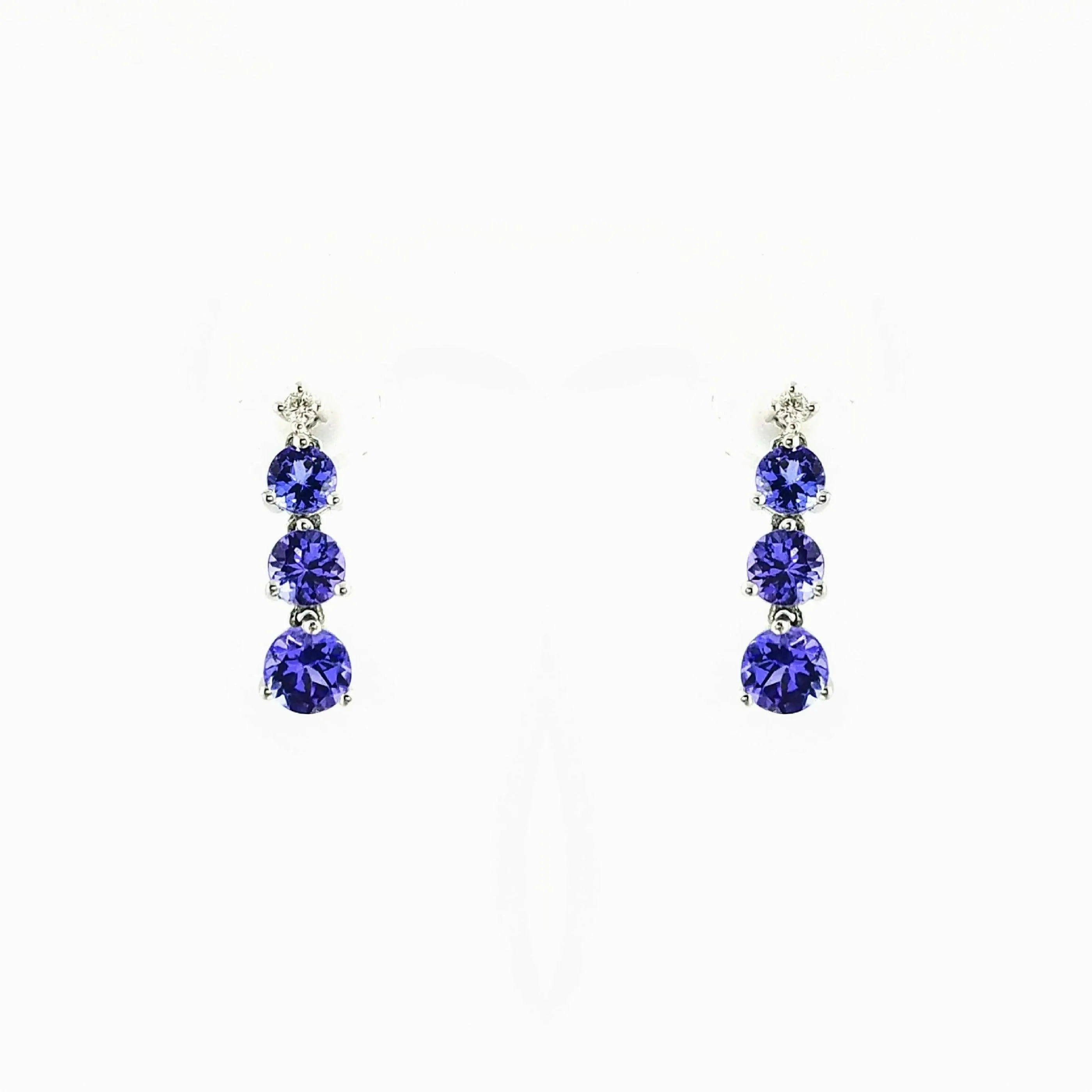9 kt White Gold Tanzanite and Diamond Dangling Earrings